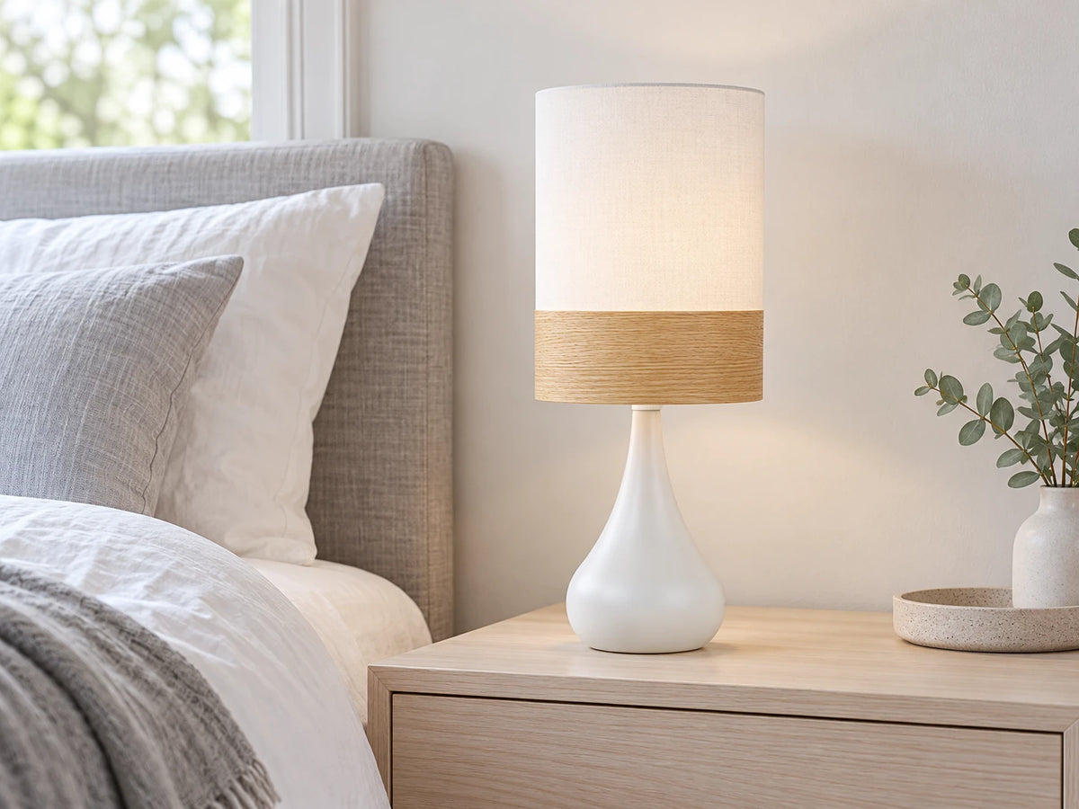 Scandinavian bedroom with a white and oak Telbix AKIRA bedside table lamp