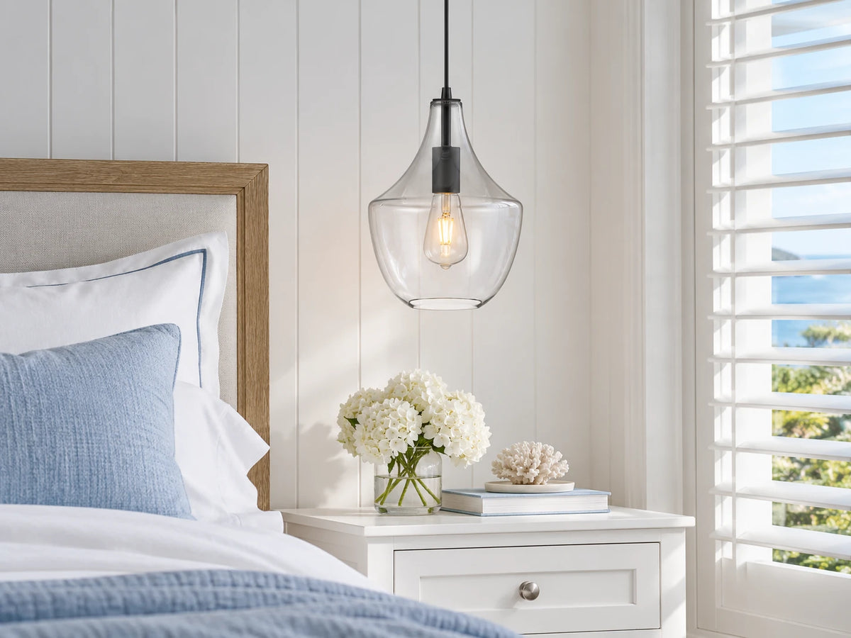 Hamptons coastal bedroom with a clear glass Domus SAIL bedside pendant